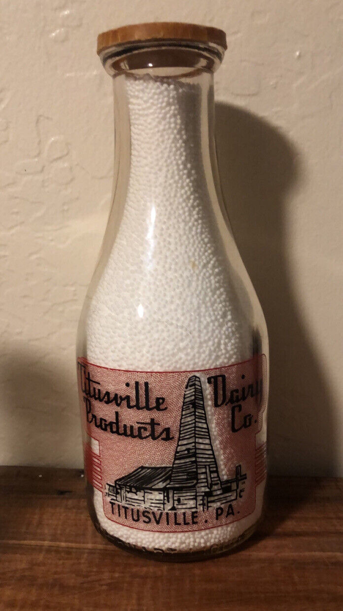TRPQ Titusville Dairy Co. Pa Pennsylvania Round Quart WW2 War Bonds Milk Bottle