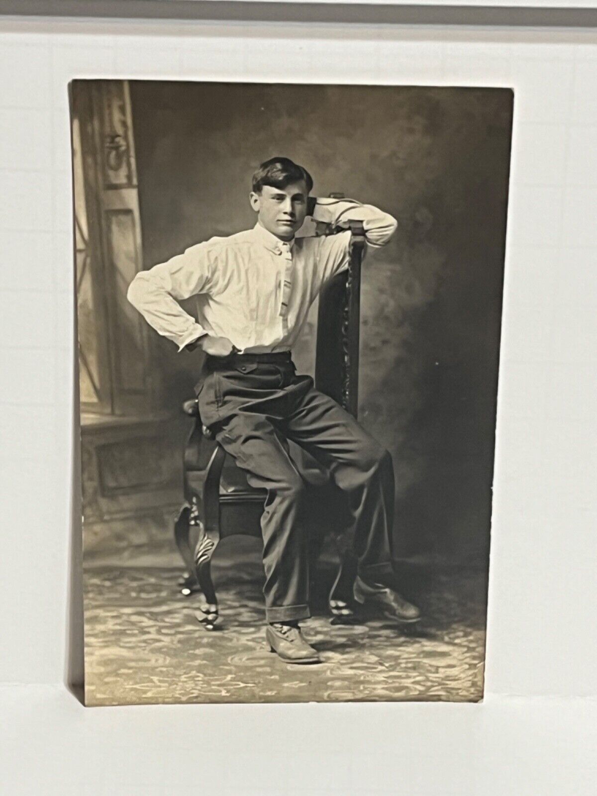 RPPC Postcard Studio Picture Young Man Posing Chair Ernie Harron A49