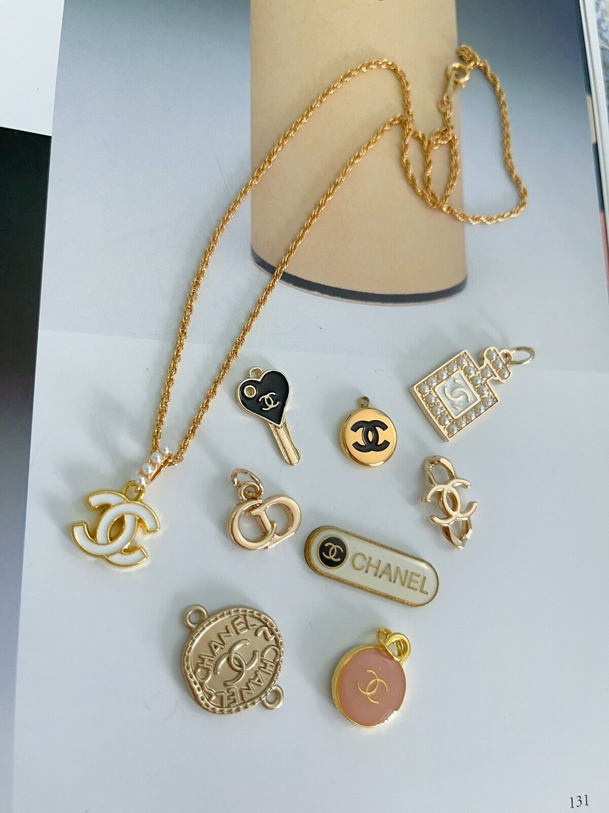 Lot of 9 Chanel buttons and Zipper Pulls