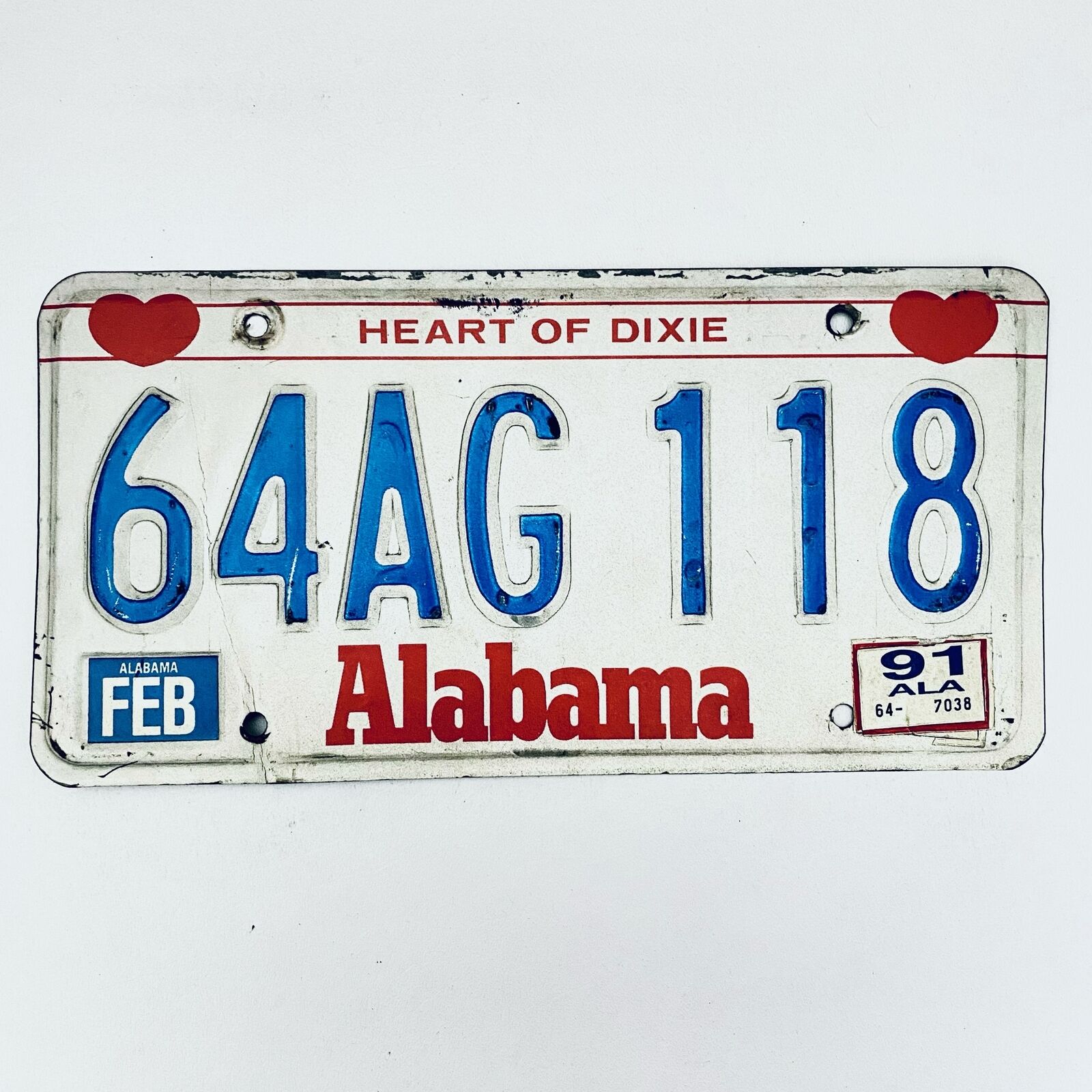 1991 United States Alabama Heart of Dixie Passenger License Plate 64AG 118