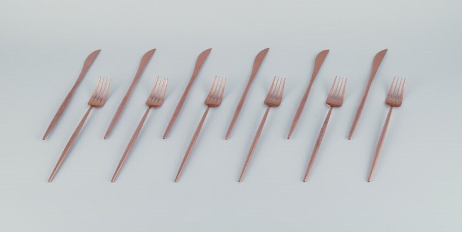 Six-person modernist dinner cutlery set in brass. Late 20th C.