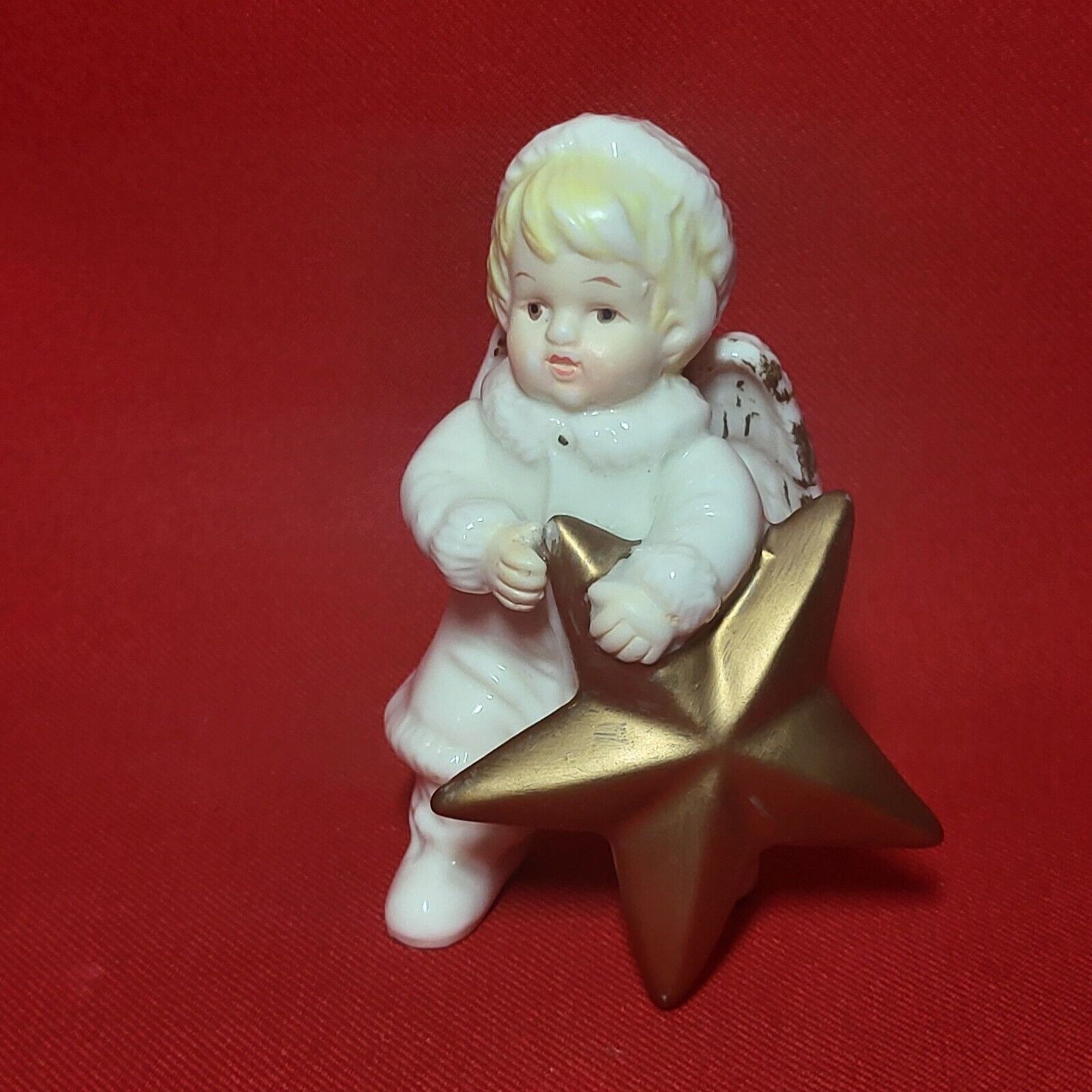 Vintage Grandeur Noel Porcelain Angel Holding a Star Figurine