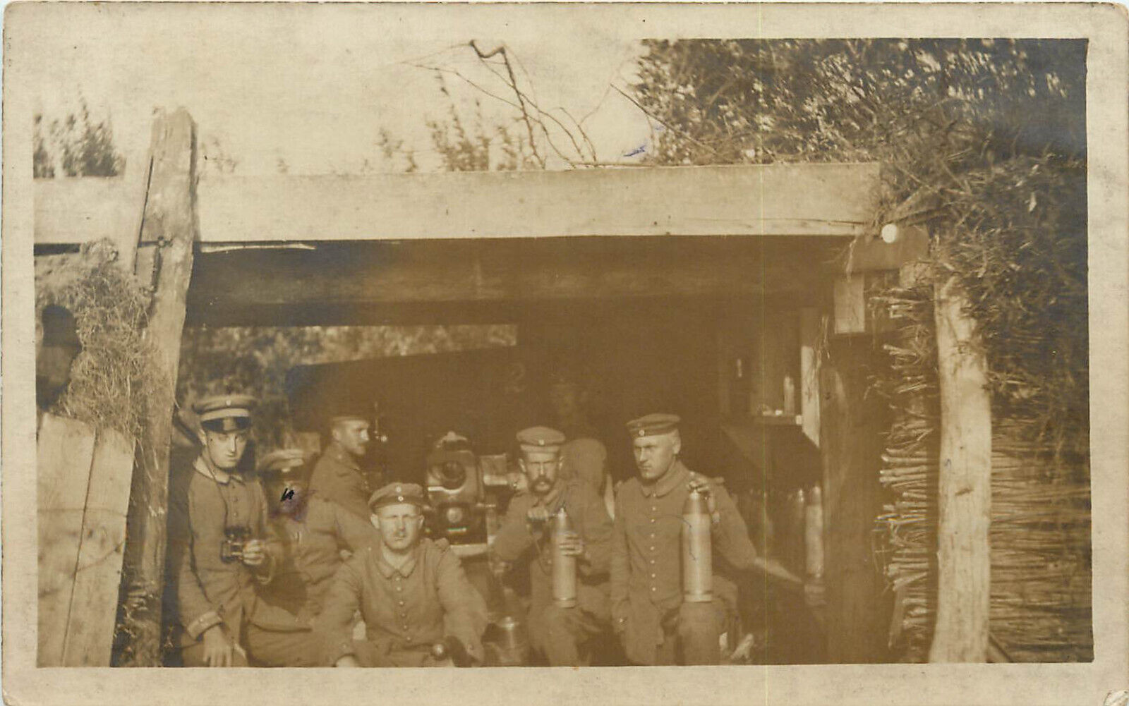 WWI RPPC Postcard Central Powers Artillery Men and officer Hold Shells In Dugout