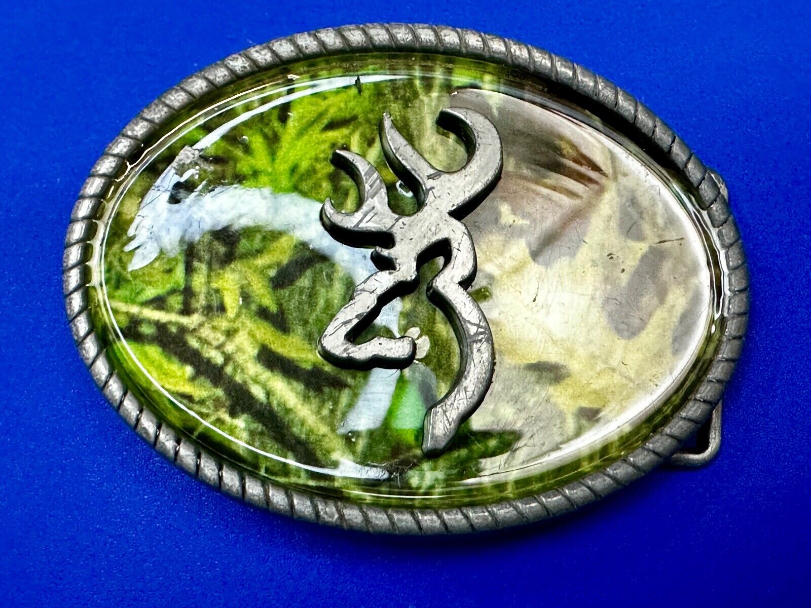 Deer Hunters Western Cowboy symbol on camouflage background Belt Buckle