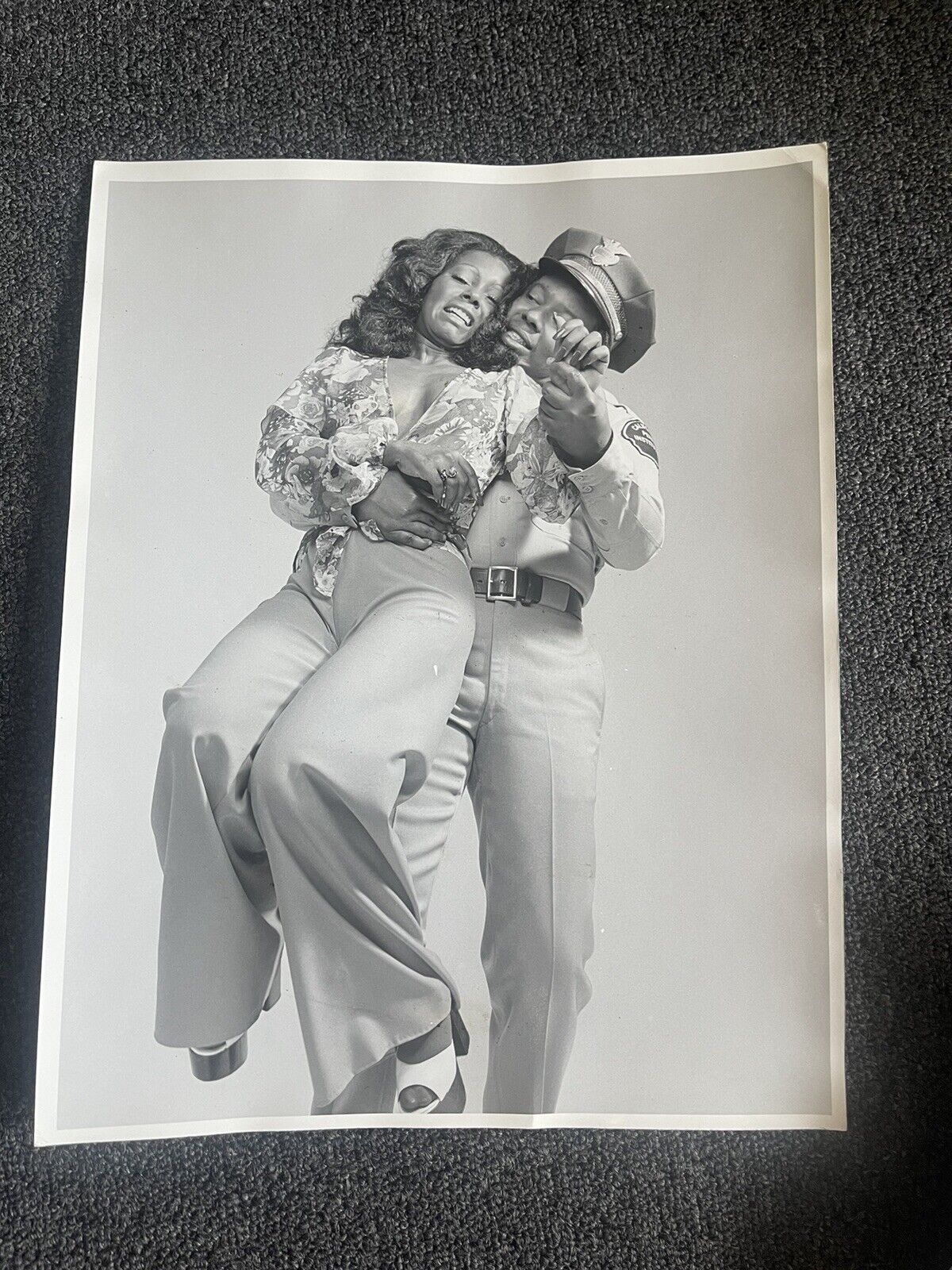 vintage 1970s large format photo Black Cop abducting Woman movie film still?