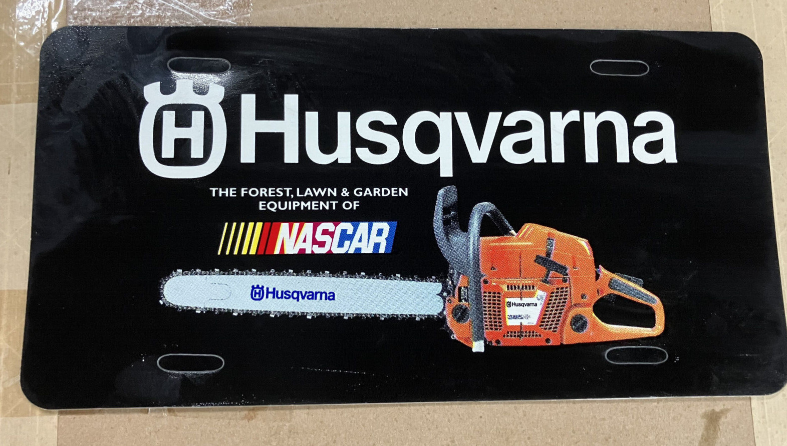 HUSQVARNA NASCAR PLASTIC LICENSE PLATE NEW  / Advertising Plate