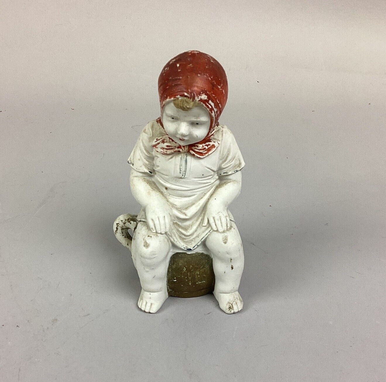 Antique Bisque Figurine of Young Child Sitting on Chamber Pot - 5.5”
