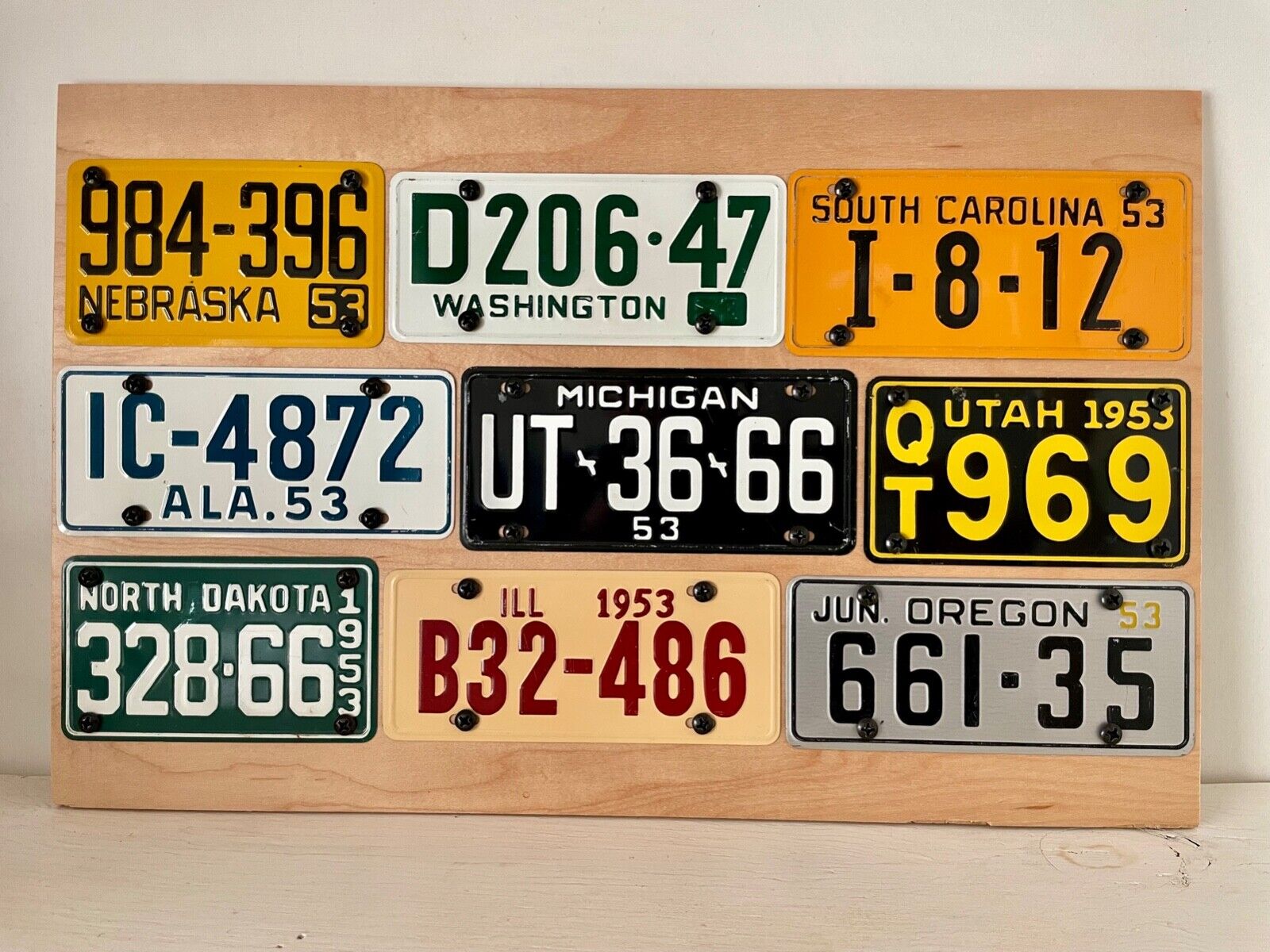 Vintage LOT of 9 Collectable Bicycle License Plates 1953 Wheaties Schwinn