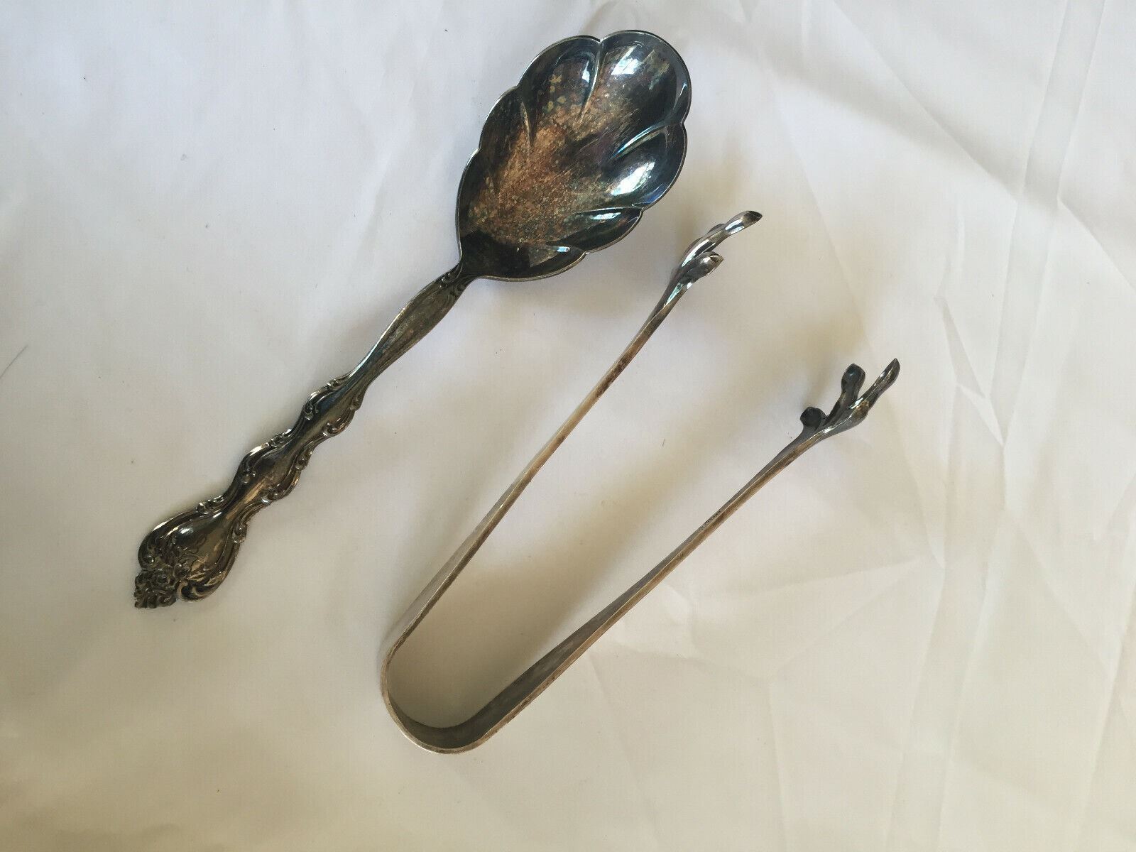 Reed&barton Silver plate clip and International silver plate big spoon