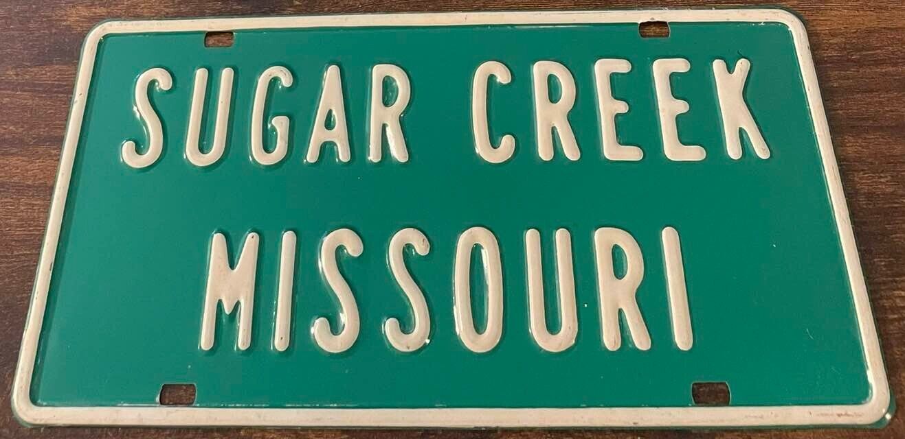 Vintage Sugar Creek Missouri Booster License Plate Embossed Steel