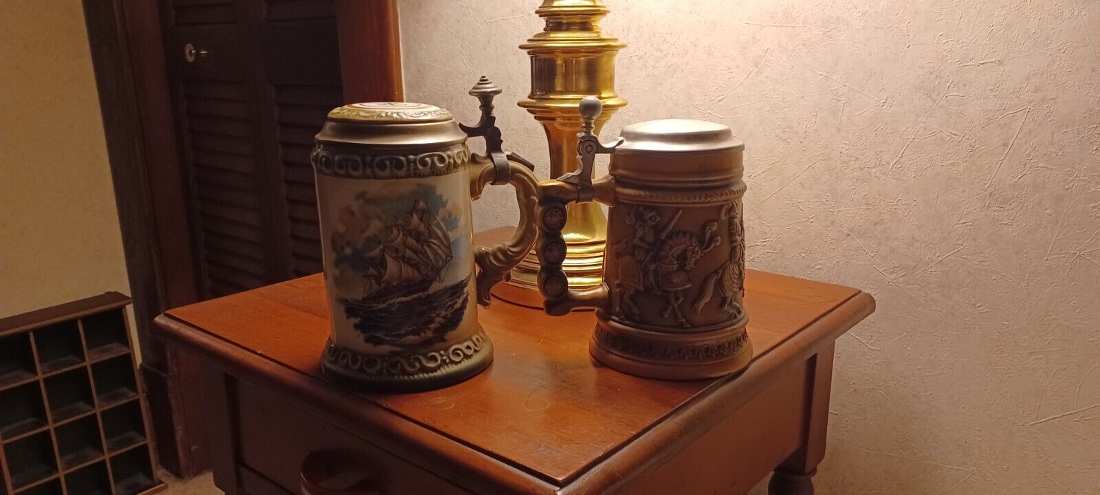 LOT OF TWO VINTAGE BEER STEINS WITH SHIPS AND MEDIEVAL FIGURES