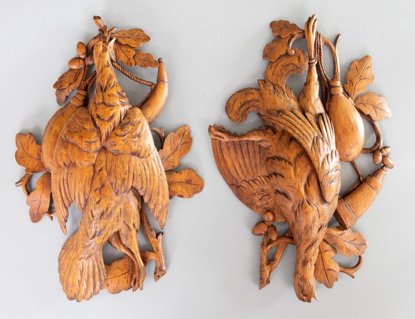 Antique Black Forest Wall Reliefs with Hunting Motifs, a pair