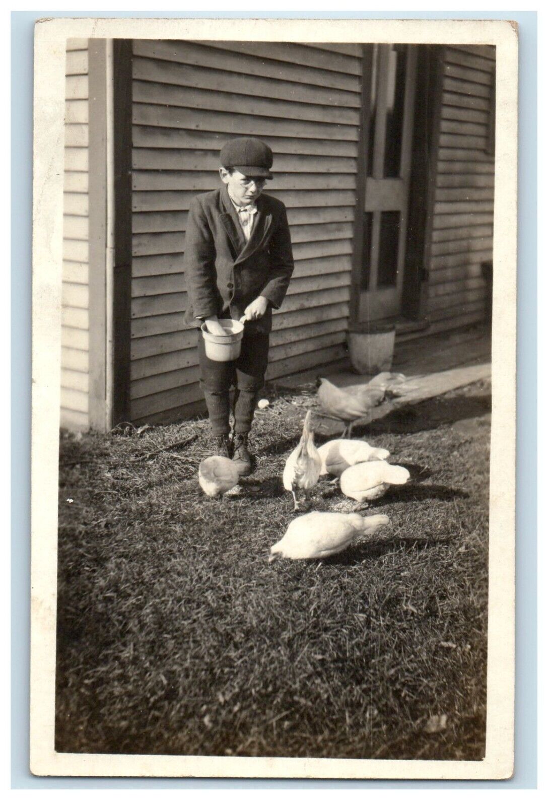 c1910's Boy Feeding Chicken Rooster Hen RPPC Photo Unposted Antique Postcard