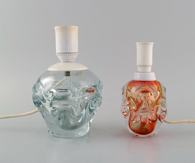 Scandinavian glass artist. Two table lamps in mouth-blown art glass.