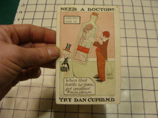 Original - POSTCARD -- NEED A DOCTOR - TRY DAN CUPID   -- 1908 to girlfriend 