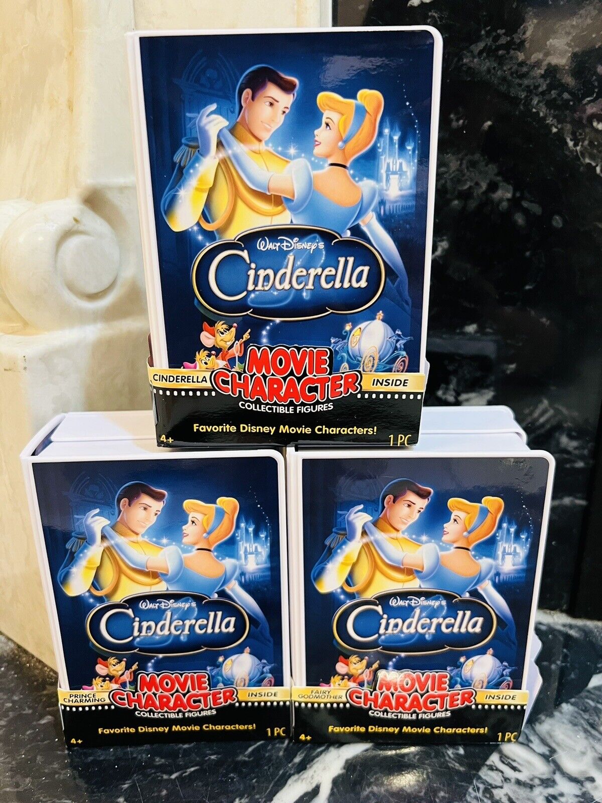 Disney’s 100th Anniversary- “3” VHS Boxes/ Figures from Cinderella