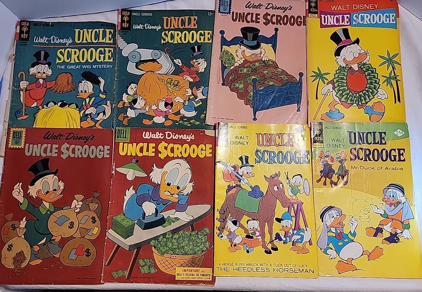 Vintage Lot of (8) Walt Disney Uncle Scrooge Comics