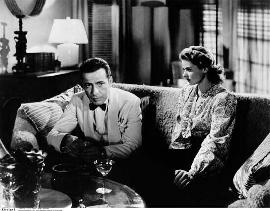 Casablanca Humphrey Bogart Ingrid Bergman sit on sofa with cocktails 8x10 photo