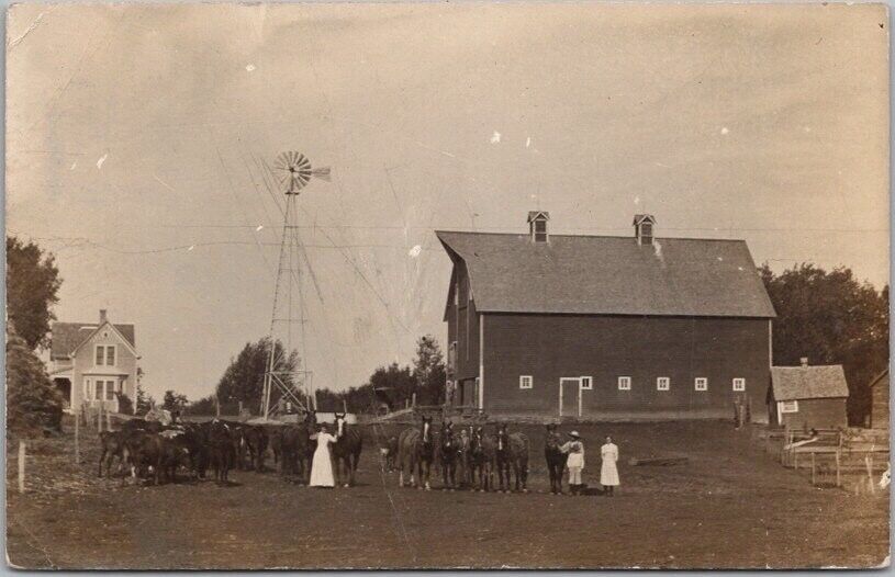 1914 HANSKA, Minnesota RPPC Real Photo Postcard FARM SCENE Barn House Windmill