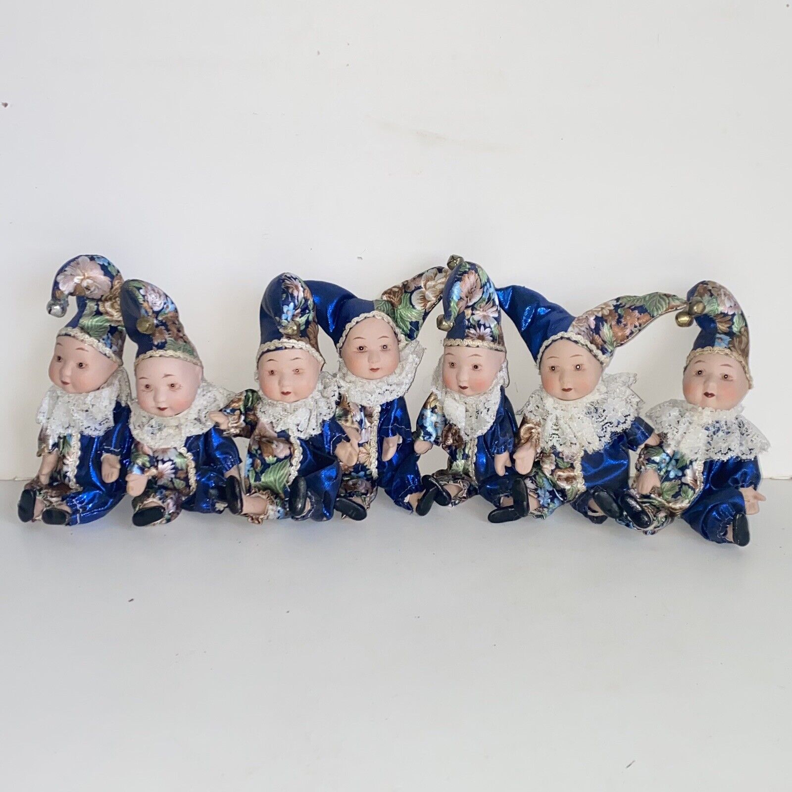 Vintage 7 Harlequin Porcelain Jester Clown Dolls Blue Floral Jumper Brass Bells
