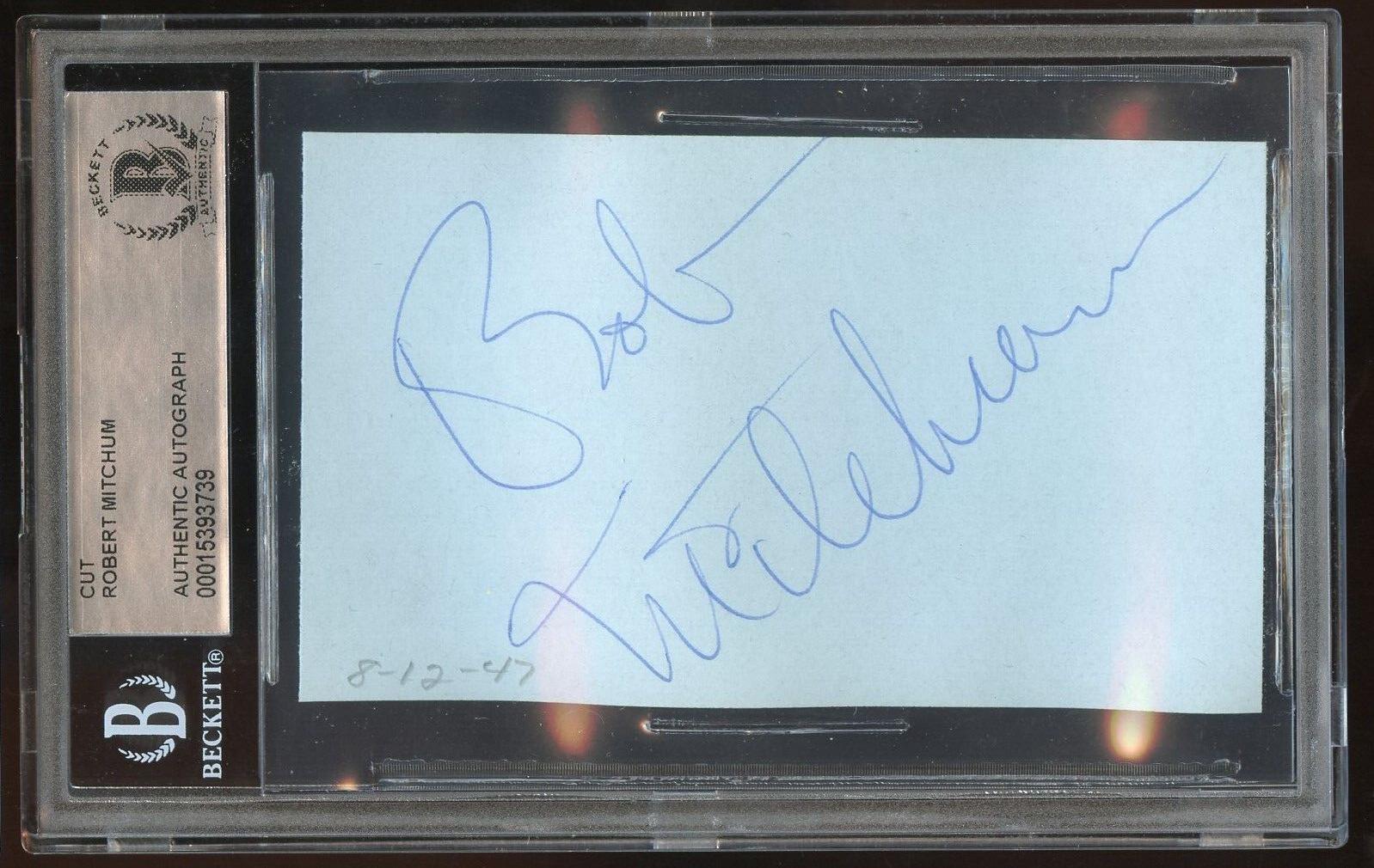 Robert Mitchum signed autograph on 8-12-47 2x3 cut American Actor BAS Slabbed
