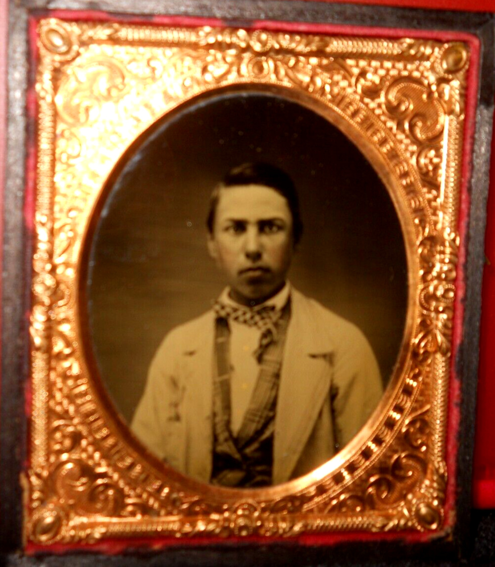 1/6th size Ambrotype of young man in half case