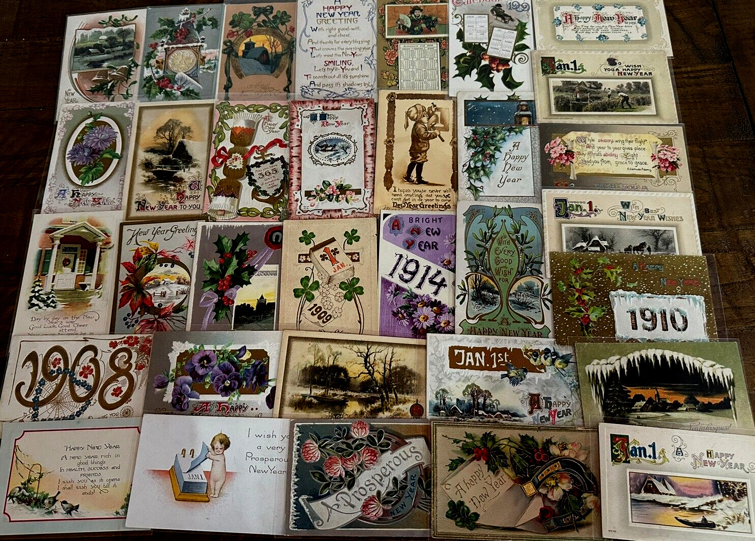 Lot of  40 Antique~NEW YEAR\'S ~Vintage Holiday ~Postcards~1900\'s~in Sleeves~h202