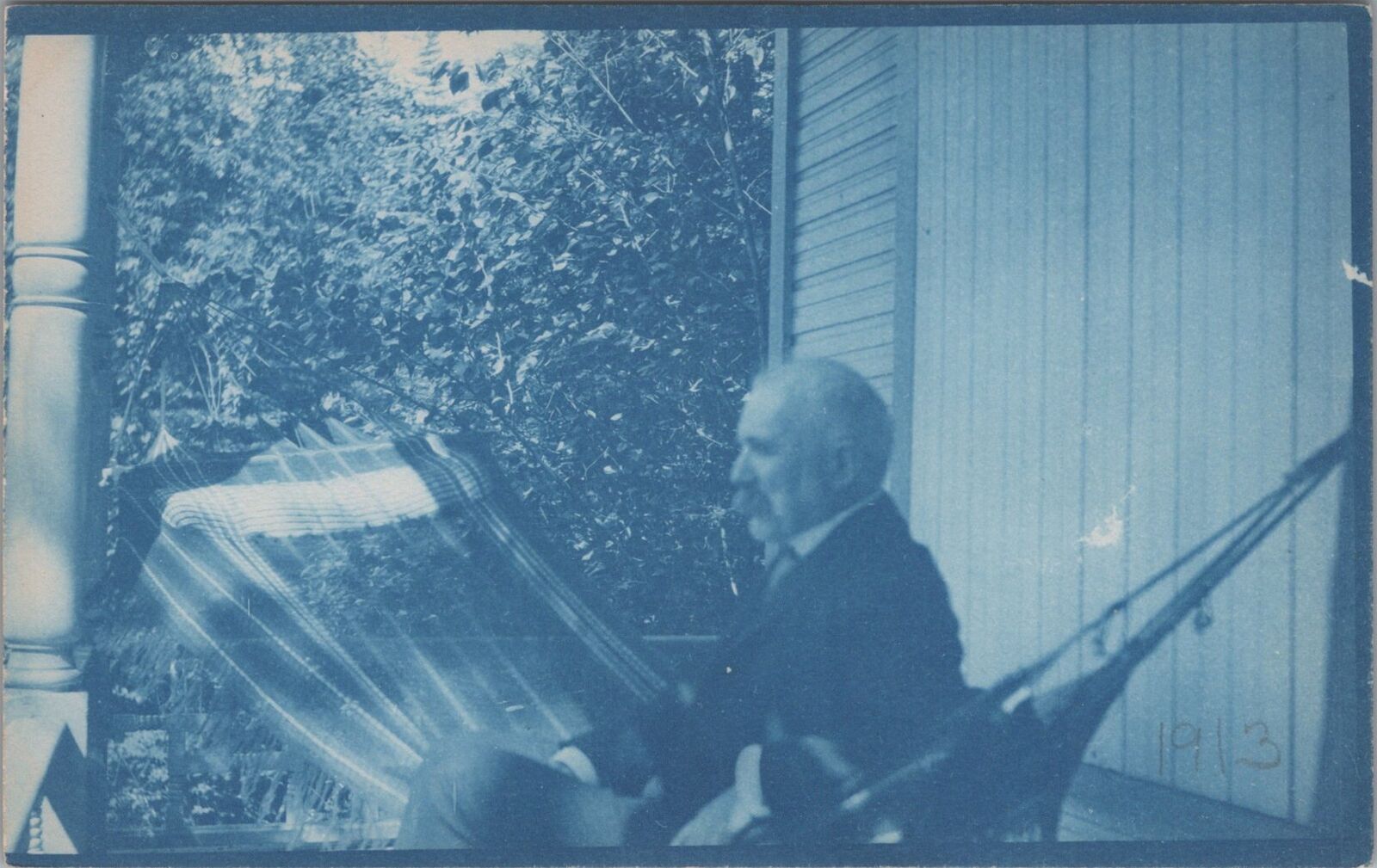 Cyanotype Postcard Man Sitting On Hammock Outside 