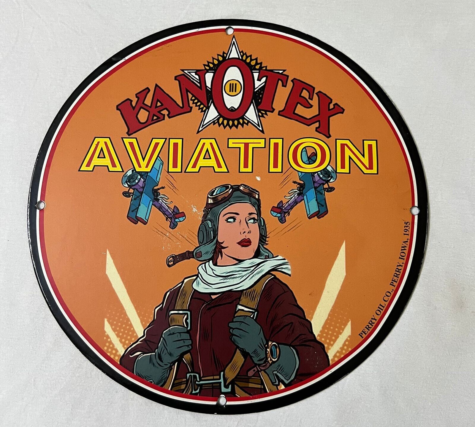 Kanotex Aviation Pinup Porcelain Enamel Sign.