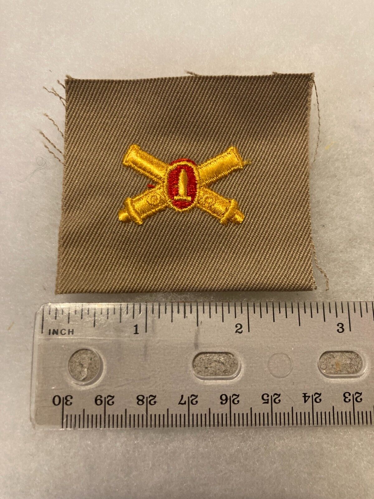 Authentic US Army WWII Coastal Artillery Badge Insignia Desert Brown