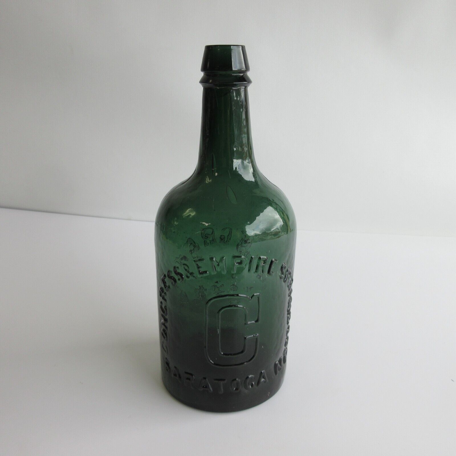 Congress Empire Spring Co Saratoga NY Embossed Green Glass Water Bottle