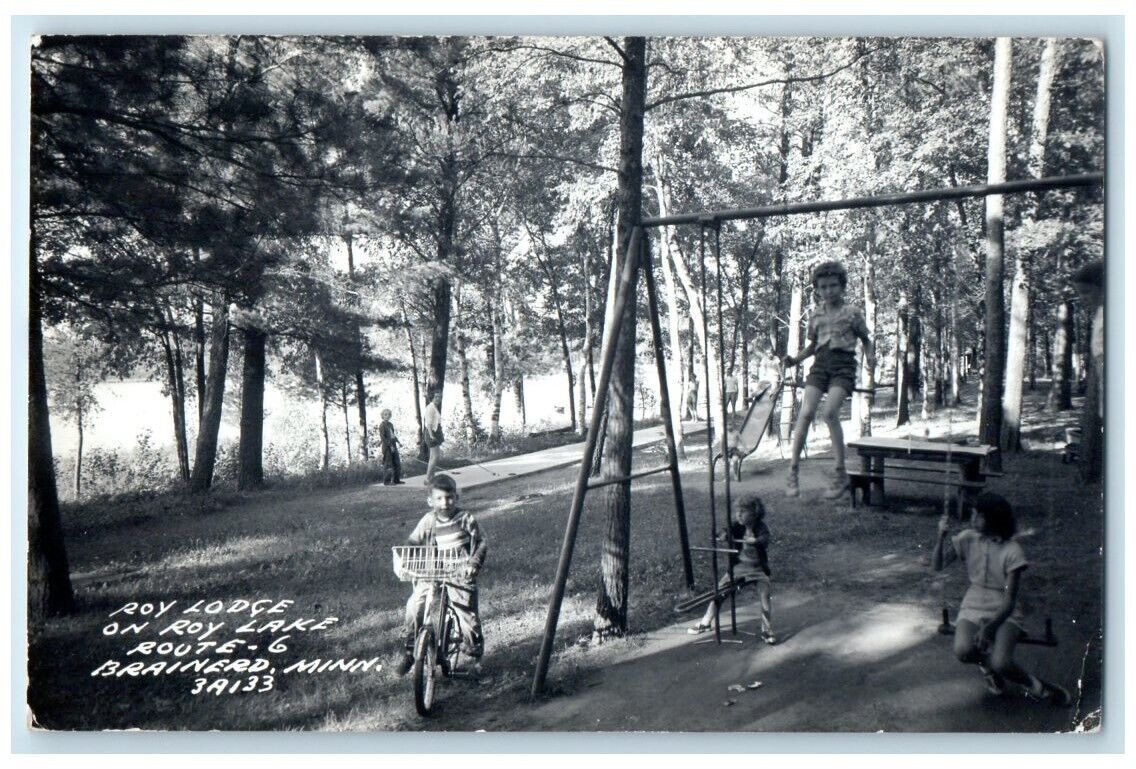 1954 Roy Lodge Playground Bike Swing Roy Lake Brainerd MN RPPC Photo Postcard
