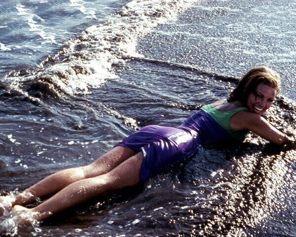 Raquel Welch in 1960\'s mini dress lying in surf on beach 8x10 inch real photo