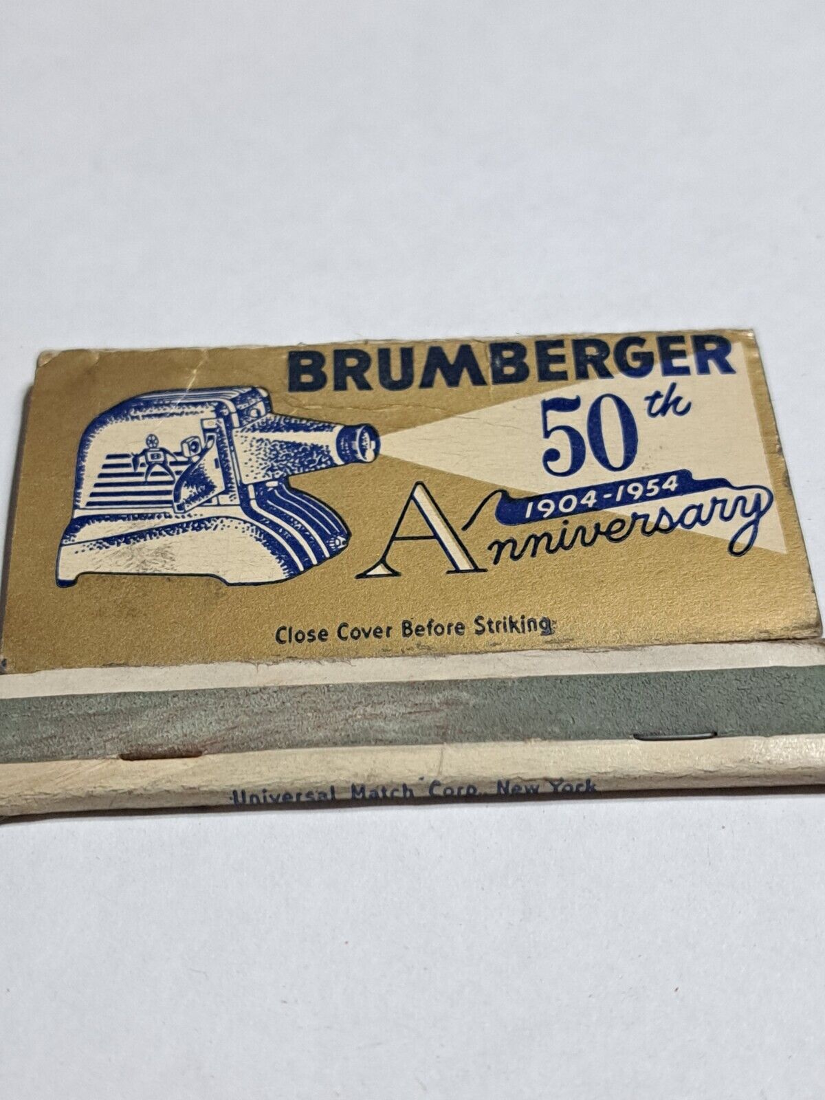 Vtg. Brumberger store 50th anniversary Brooklyn 32 New York matchbook empty 