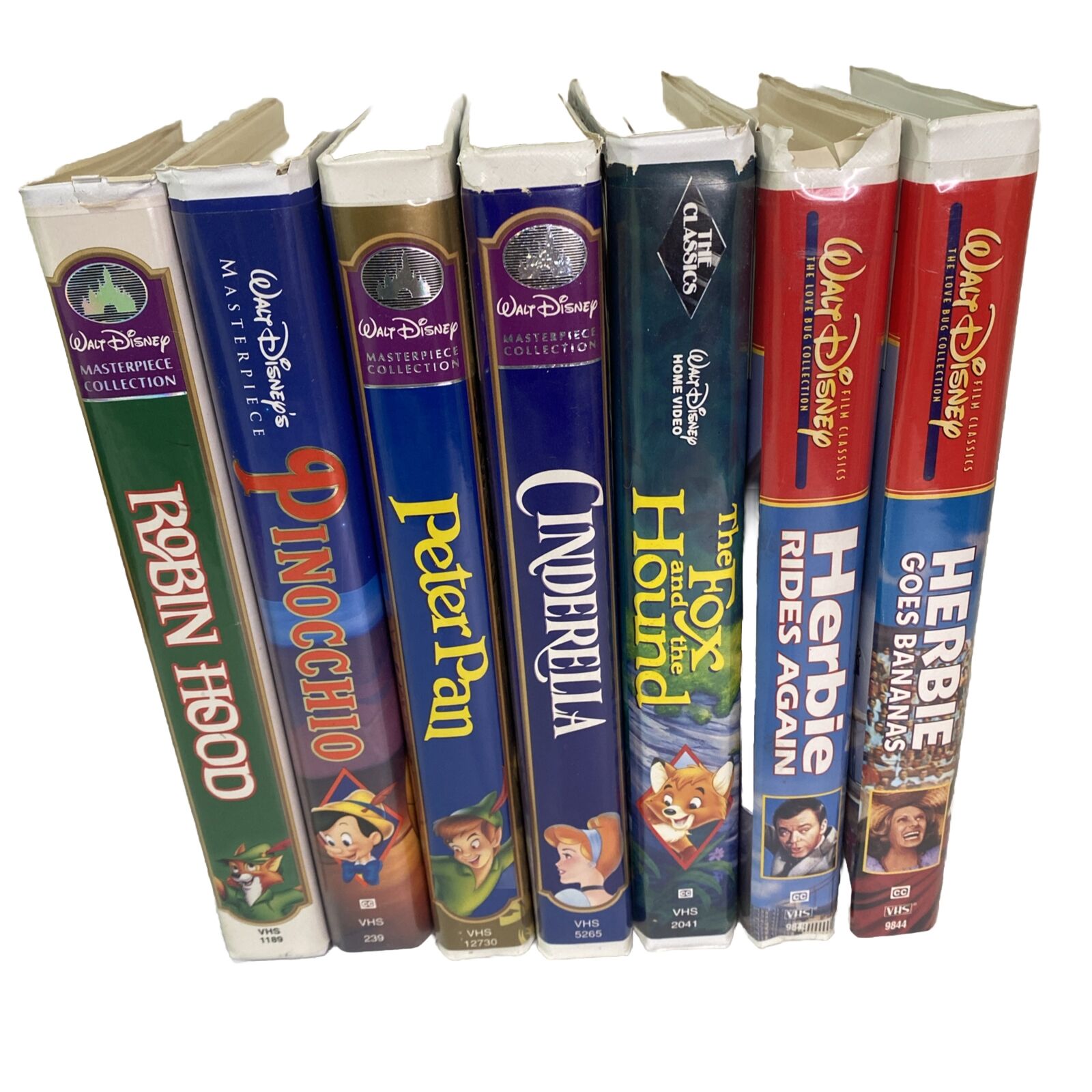 Disney VHS Lot of 7 Movies Clamshell Peter Pan Pinocchio Robin Hood Cinderella