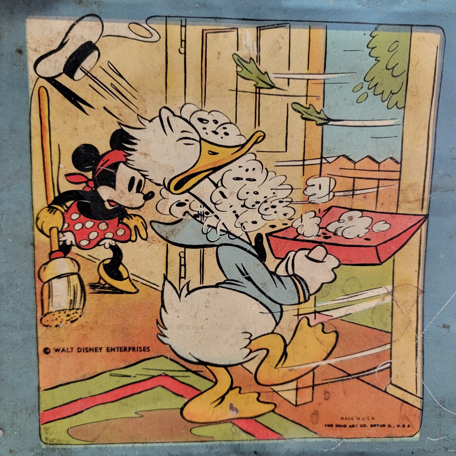 Vintage Donald Duck & Minnie Ohio Art Tin off of a 1930s Disney toy sweeper.