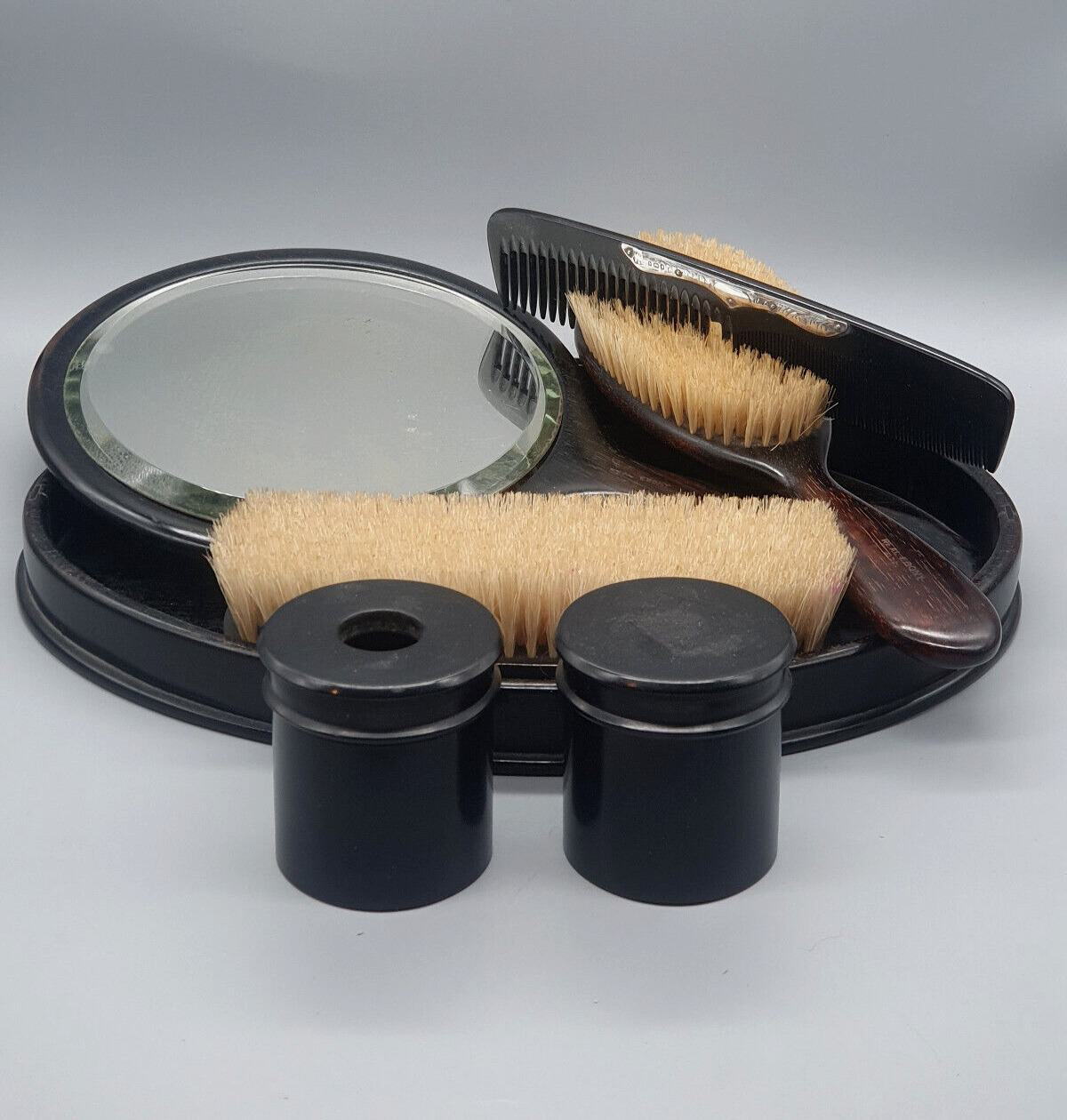 An Elegant Ebony Dressing Table Set From the early 20thC