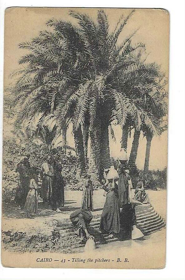 EEGYPT CAIRO CAIRO TILLING THE PITCHERS