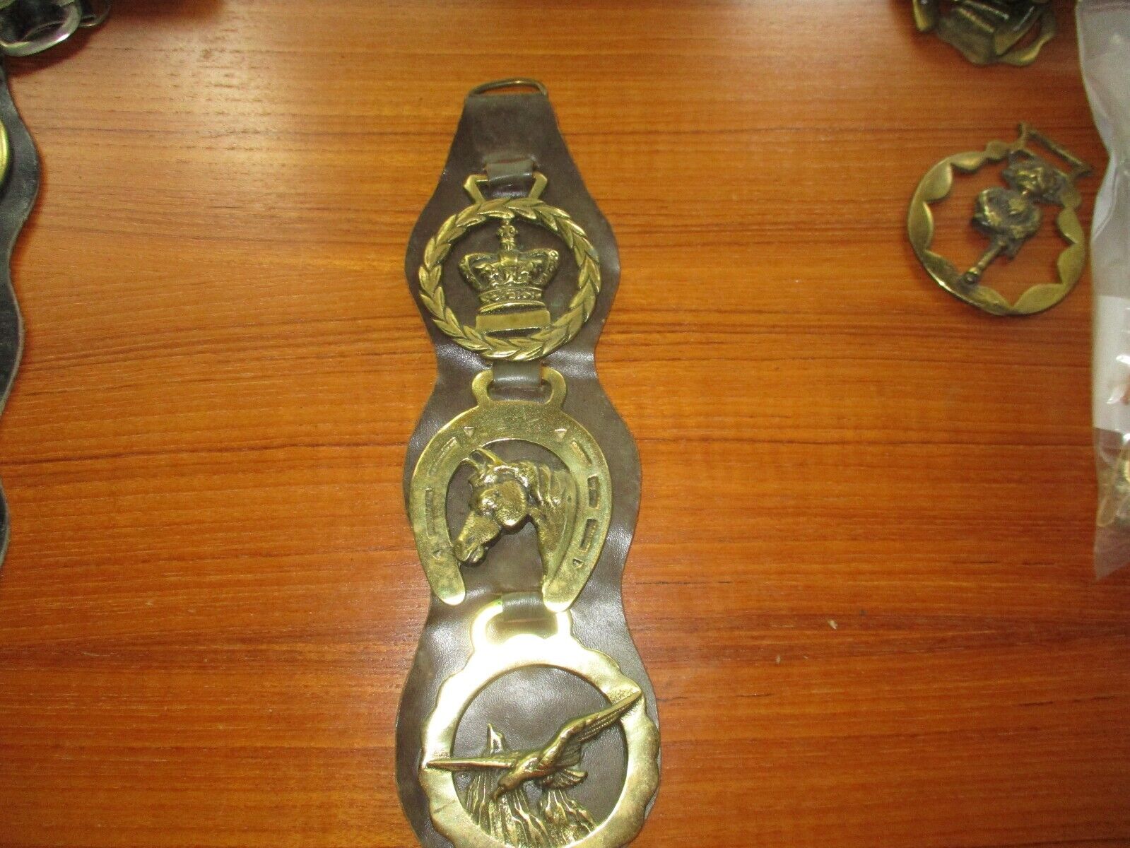 Three Vintage Horse Brass Medallions on  leather strap