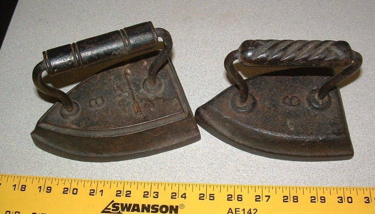 2 Antique Vintage Sad Irons, a #8 flat Iron W/ Arrow & eagle &a #6 unmarked cast