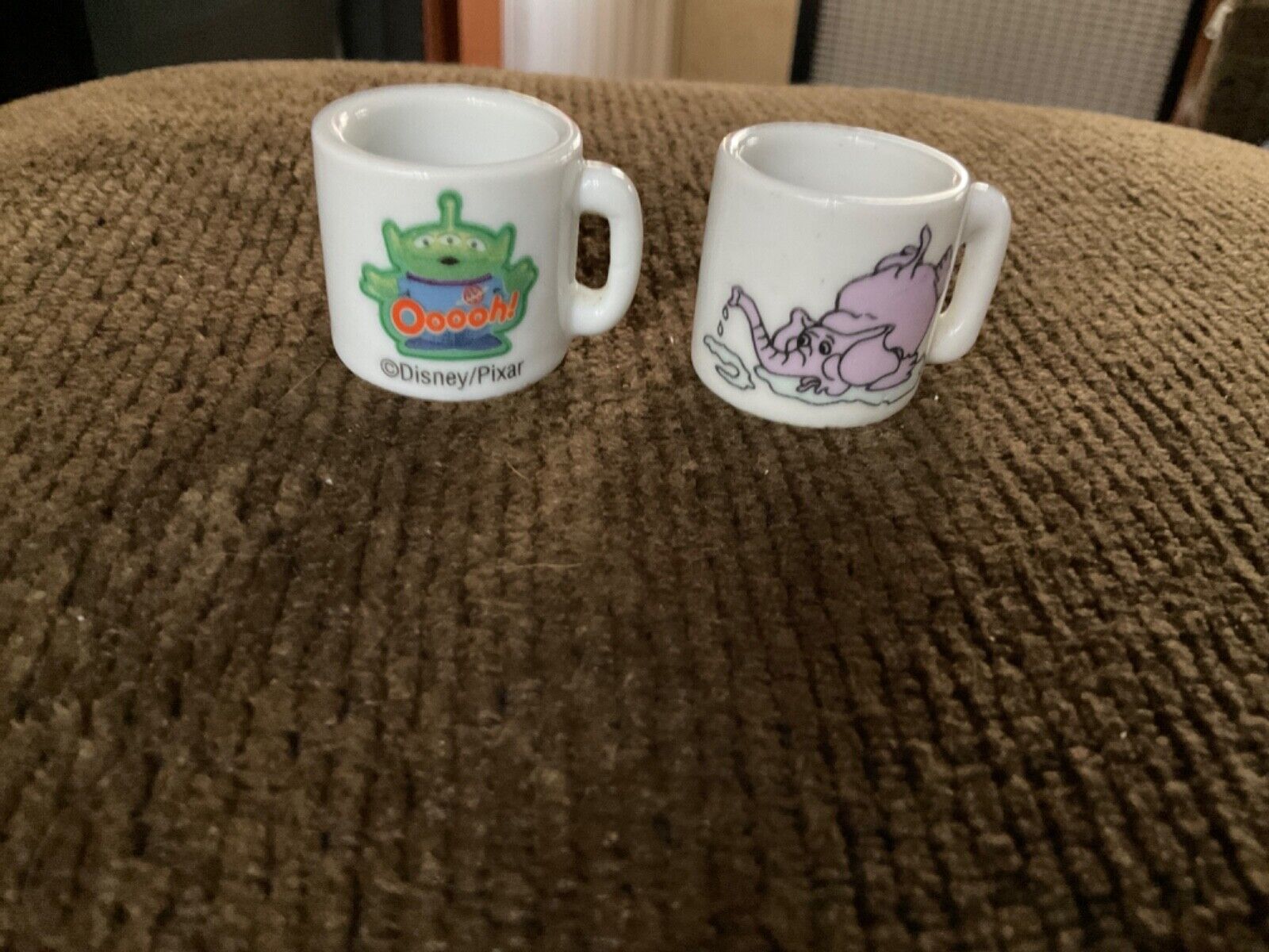 two tiny mugs