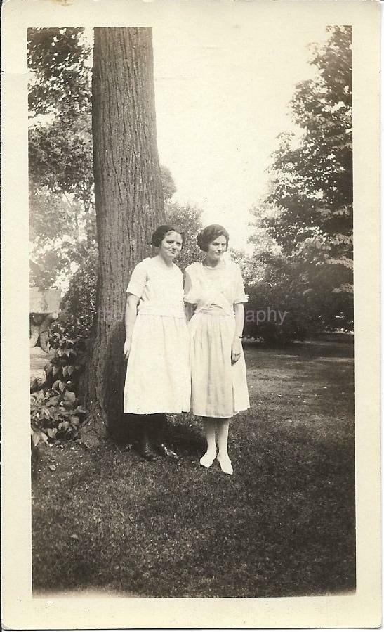 Found PHOTOGRAPH bw TWO YOUNG WOMEN IN WHITE STANDING BY A TREE Vintage 912 1 Y