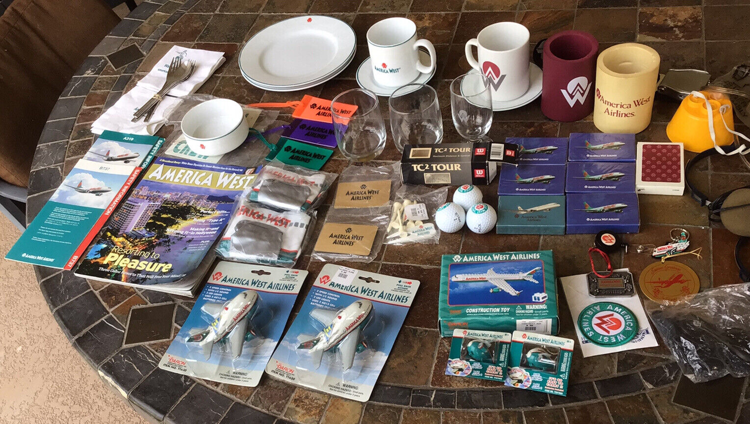 large lot of America West Airline pieces plates, bowl, cups,key chains ear phone