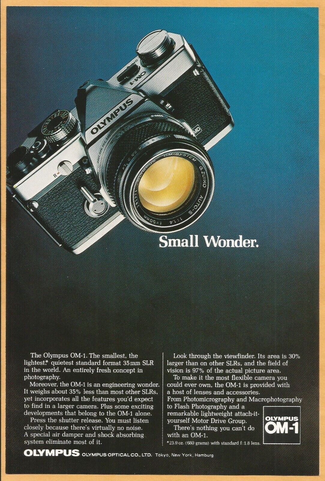 OLYMPUS OM-1 camera - Small Wonder - 1975 Vintage Nat Geo Print Ad