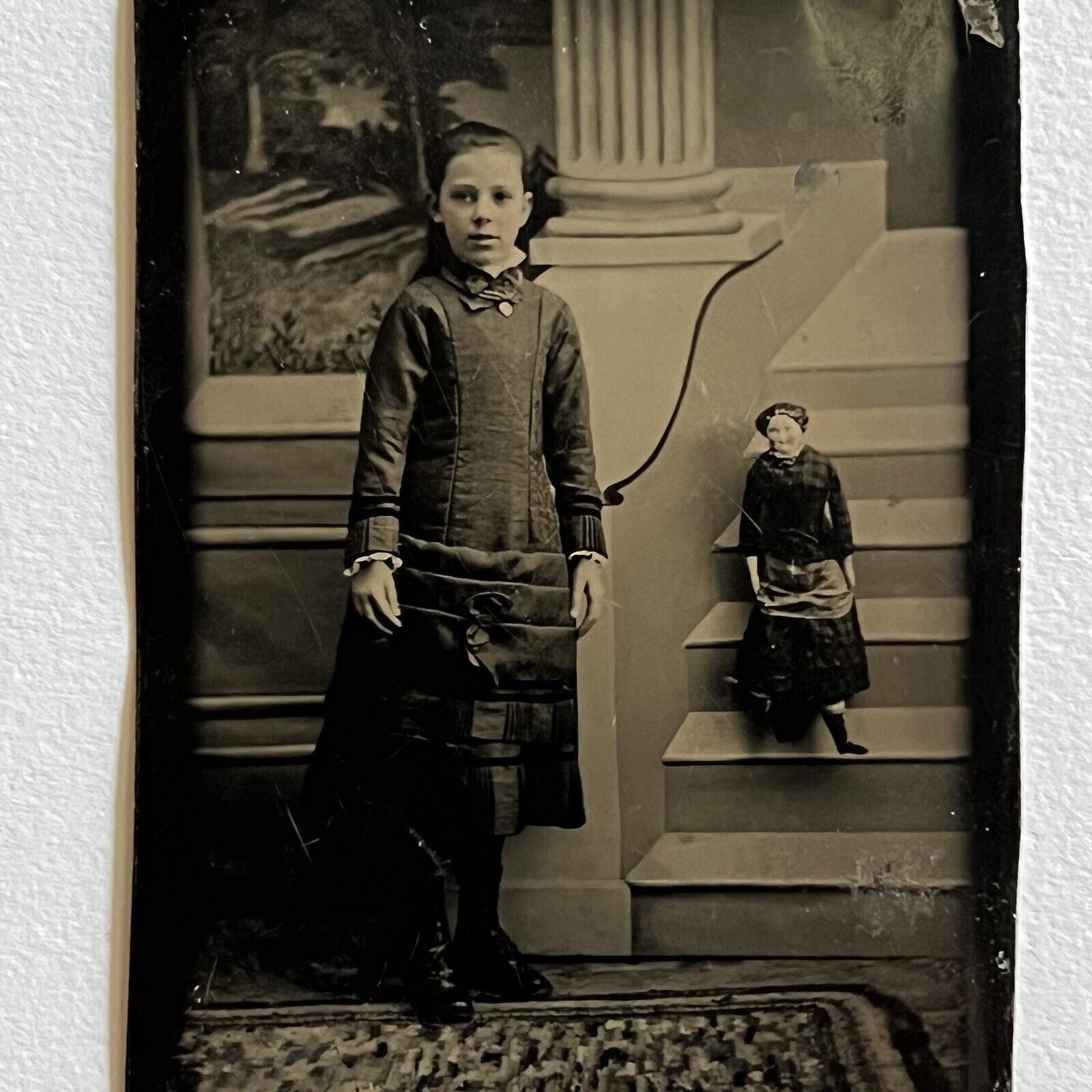 Antique Tintype Photograph Adorable Little Girl With Lively Doll On Steps Odd