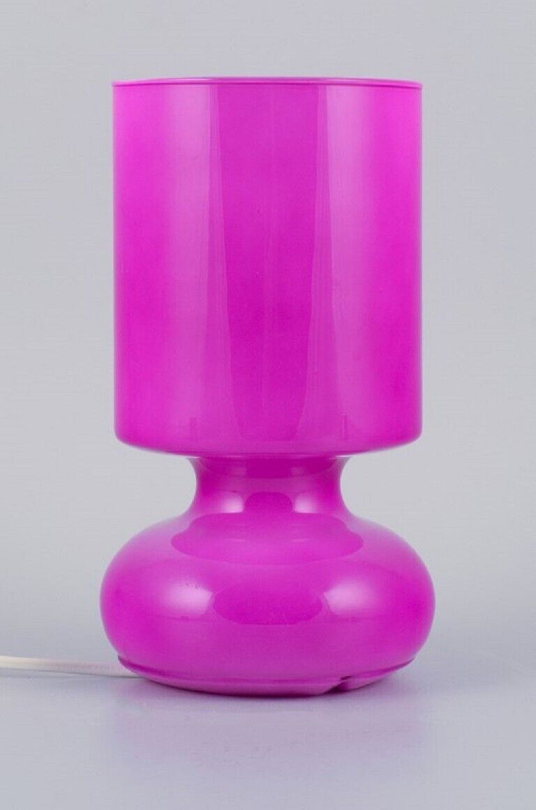 Scandinavian designer, table lamp in pink glass. Late 1900s.