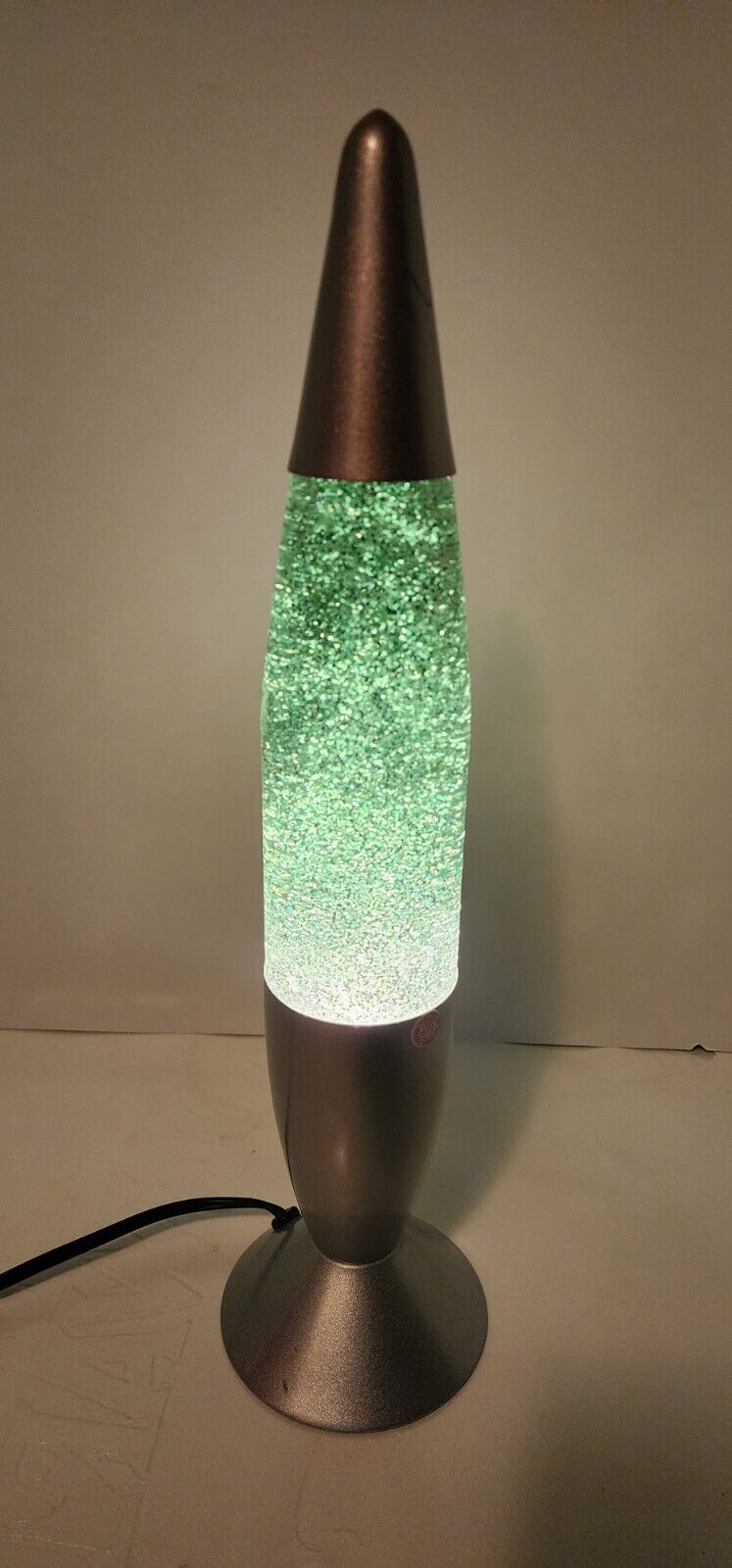 2001  Pliable Art Motion Glitter Silver Bullet Rocket Lava Lamp - Green Glitter 