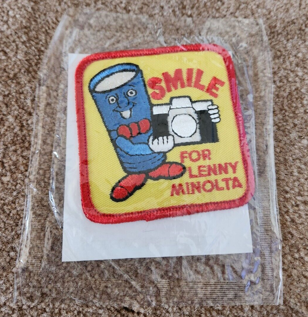 Vintage brand new Smile For Lenny Minolta iron on Patch, Camera, lens, sealed