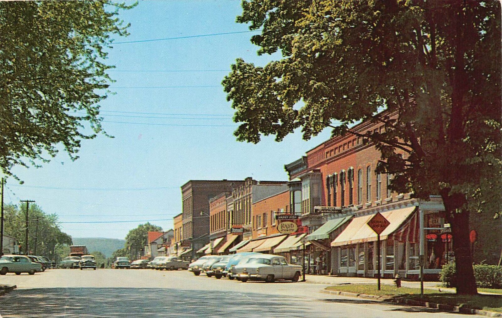 Mansfield PA Pennsylvania Main Street Downtown Rexall Pharmacy Vtg Postcard D37