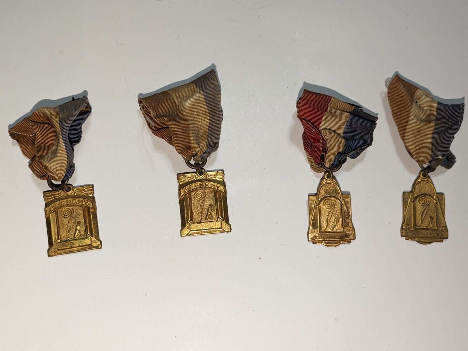 4 Vintage Long Bow Archery Marksman Awards Red White And Blue M.B.H. 